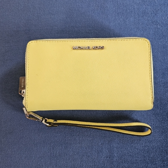 Michael Kors Handbags - Authentic MK Jet Set Wristlet In Sunshine Yellow